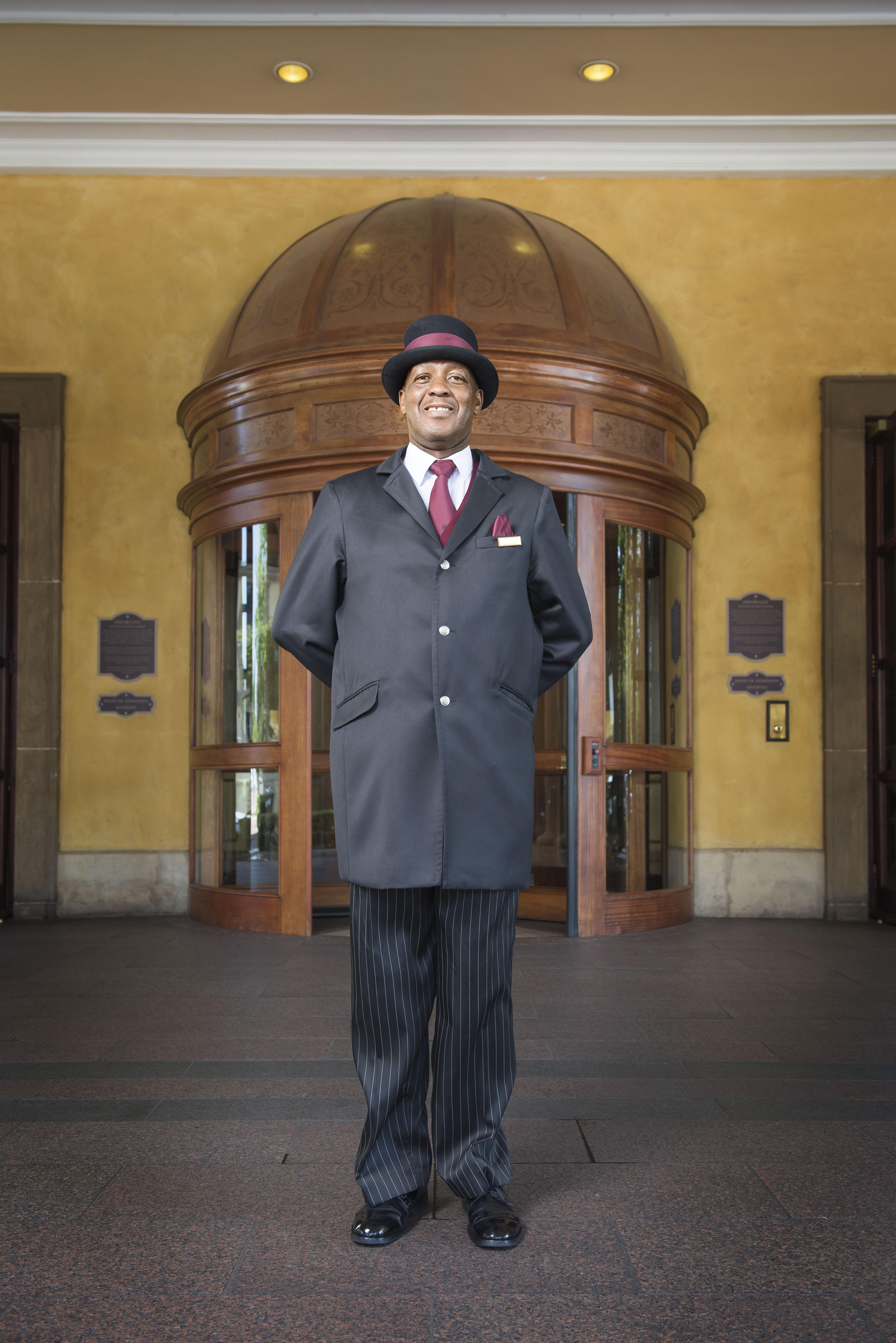 Palazzo Hotel Fourways Exterior photo A doorman at a hotel