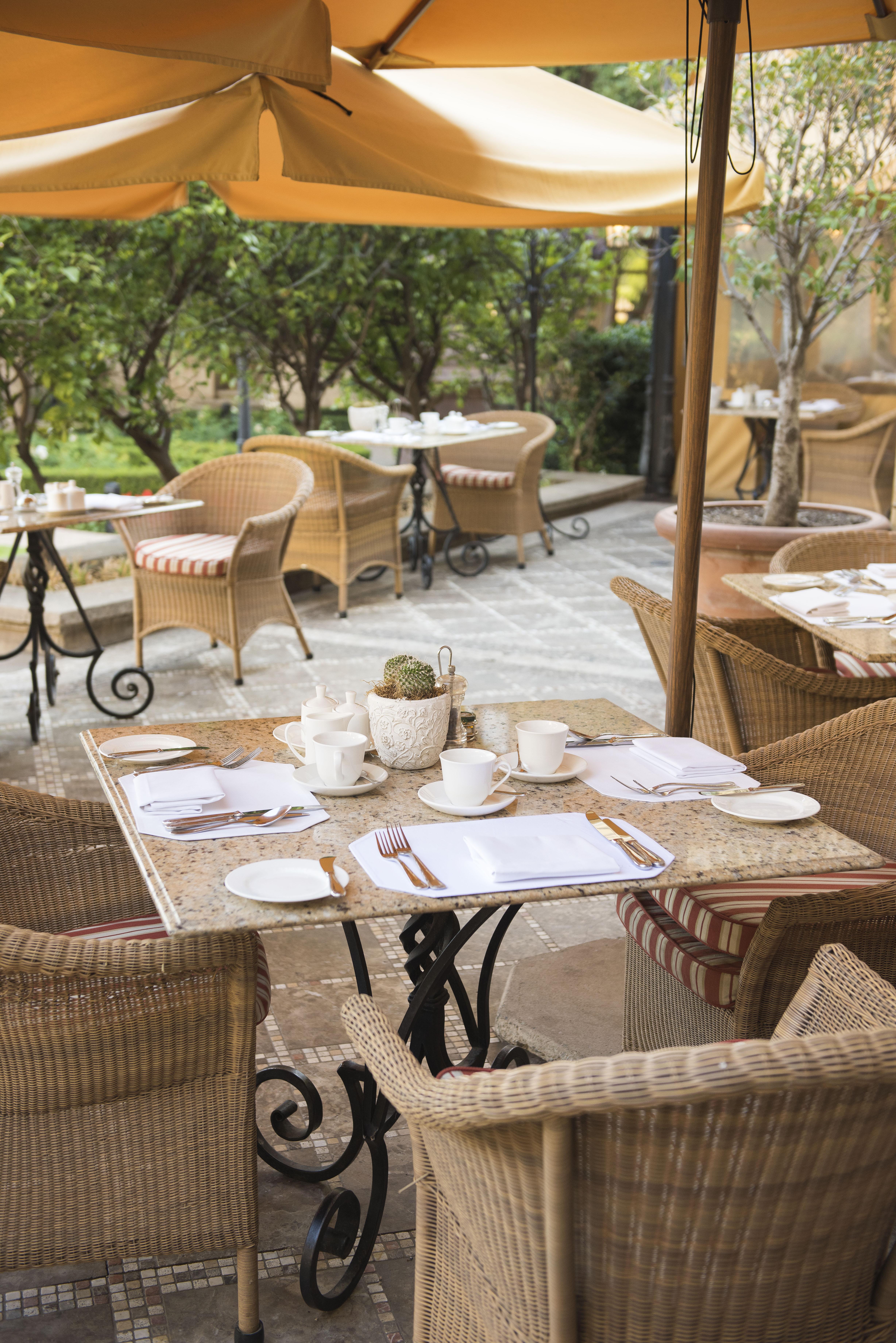 Palazzo Hotel Fourways Exterior photo A table set for breakfast